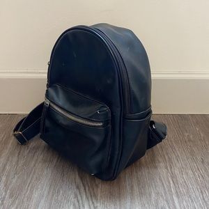 Mini black backpack with top front pocket